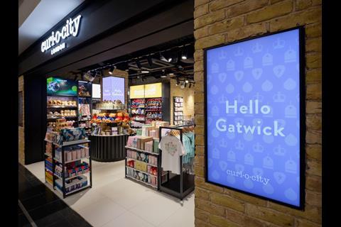 Exterior of Curi.o.city store, Gatwick Airport, with a sign saying 'Hello Gatwick'
